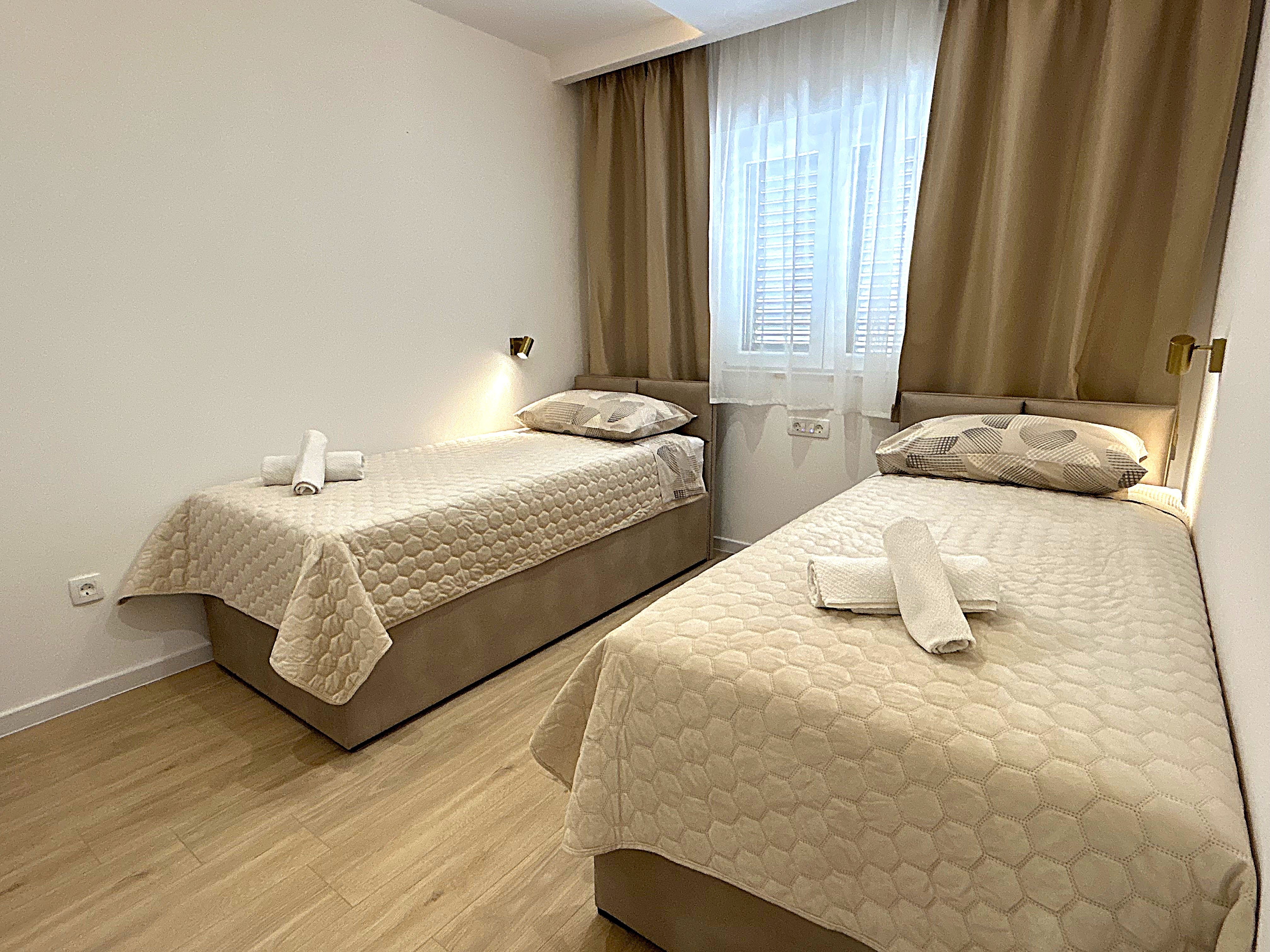 Dvokrevetna soba u apartmanima Zora Okrug Double bedroom